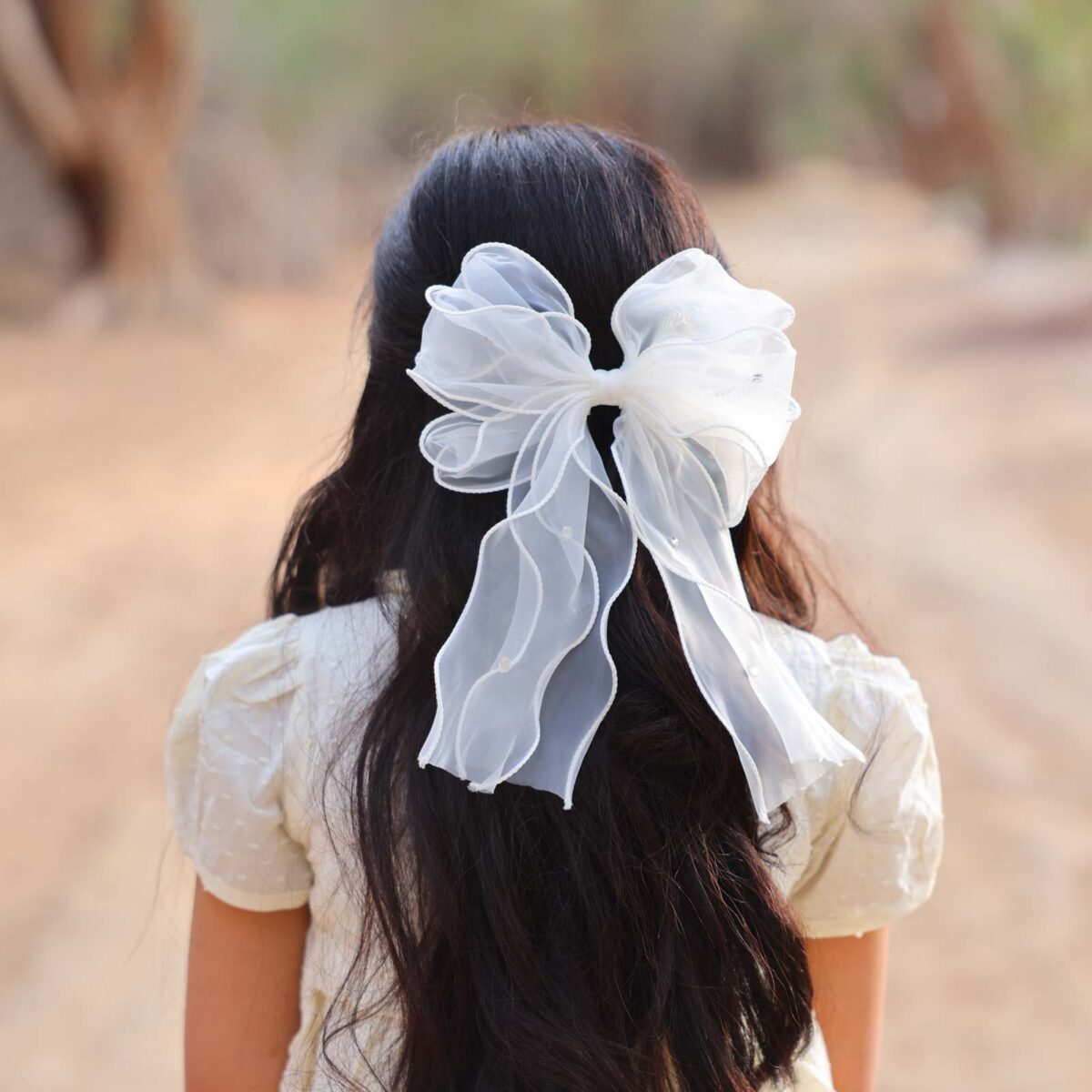 Sheer Rhinestone Bow Hair Clip - Image 1
