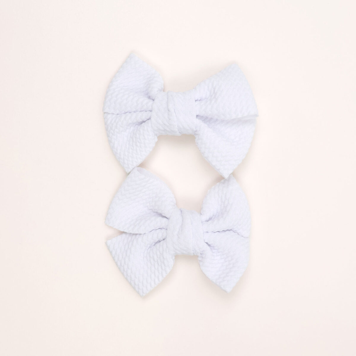 White Textured Bow Hair Clips - Image 1